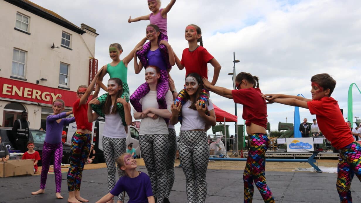 Students of the Drillaz Circus School performing a human triangle