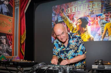 out-rise-up_MG_4746 bald man with hawaiian shirt on DJing