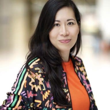 Head shot of a lady with black hair