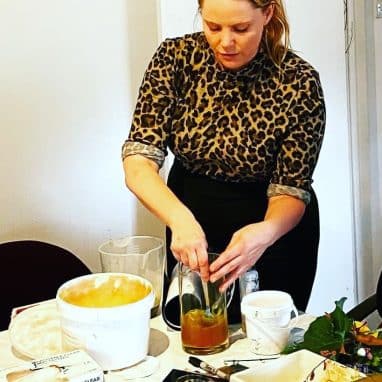 Lady in leopard print making art