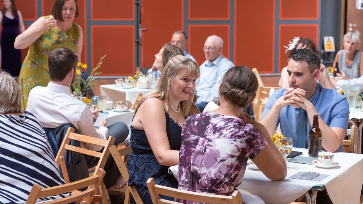 Wedding guests socialising