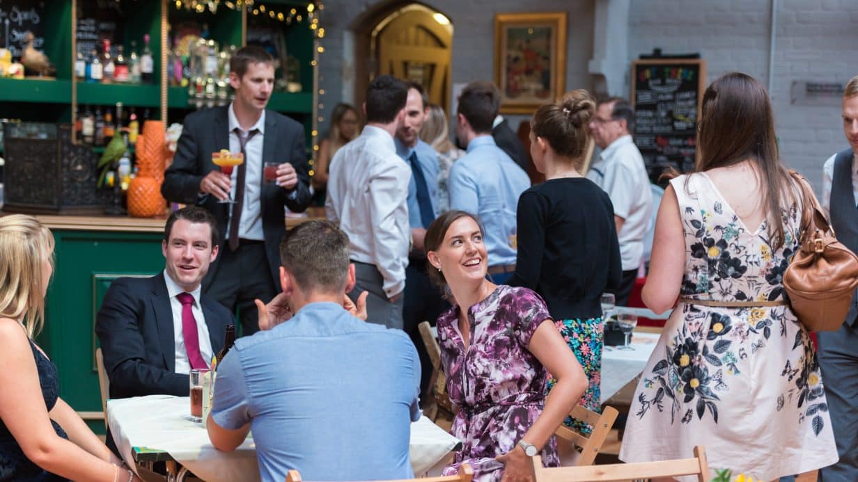 Wedding guests having a drink