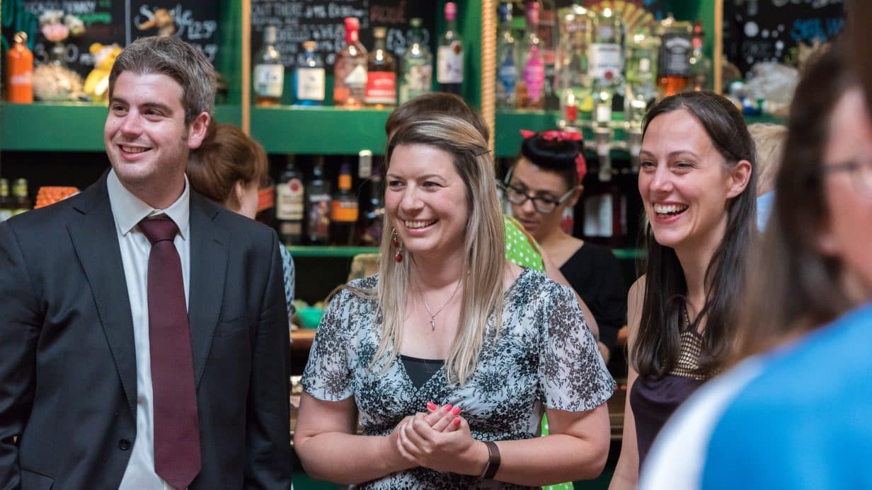 Smiling wedding guests