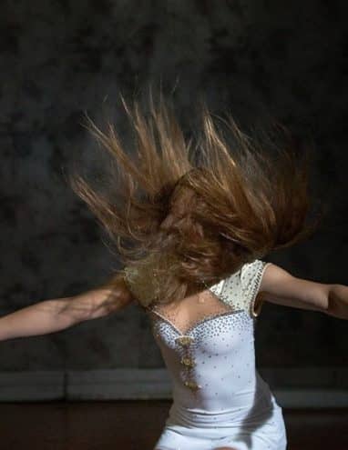 Woman whipping her hair around