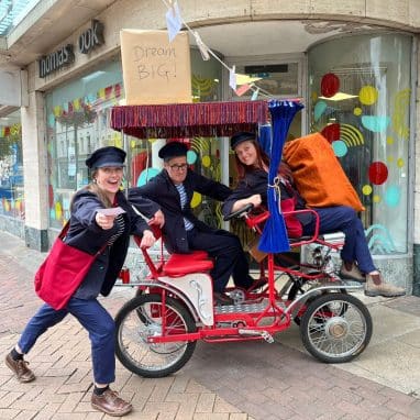 People on a quadracycle