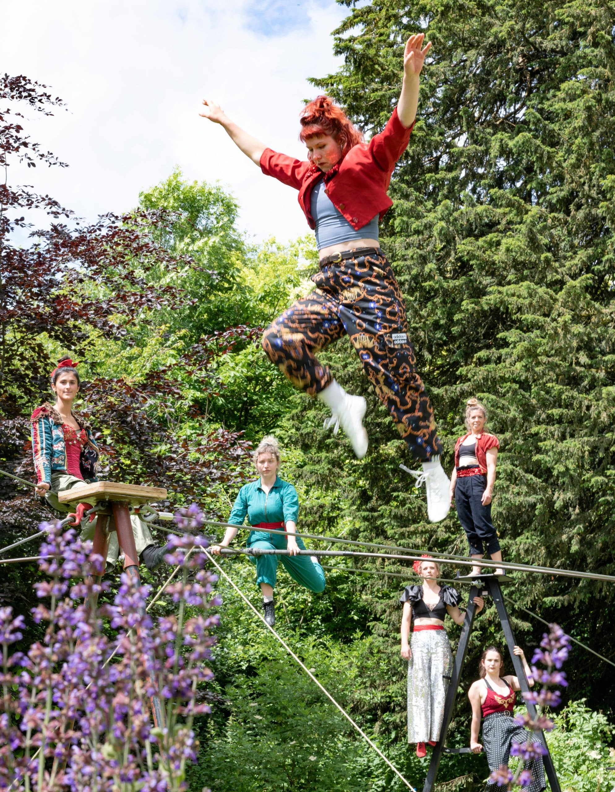 ElevateHer Magnus Dennis – Phoebe Baker Lady balancing on tight wire