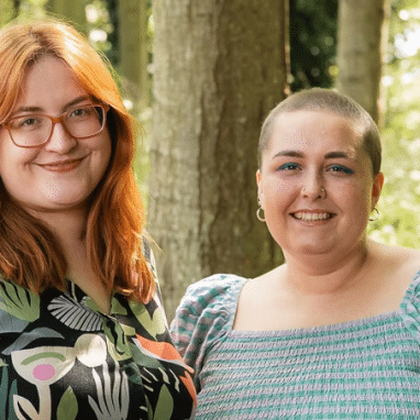 Two people smiling