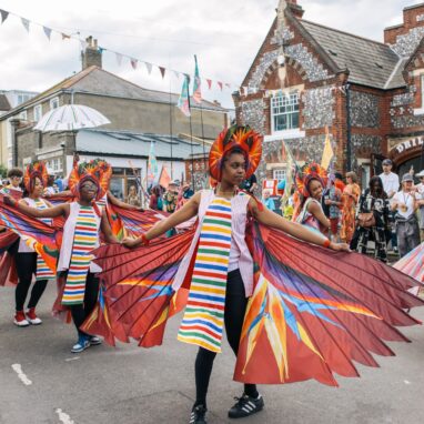 Dancers in front of the Drill House