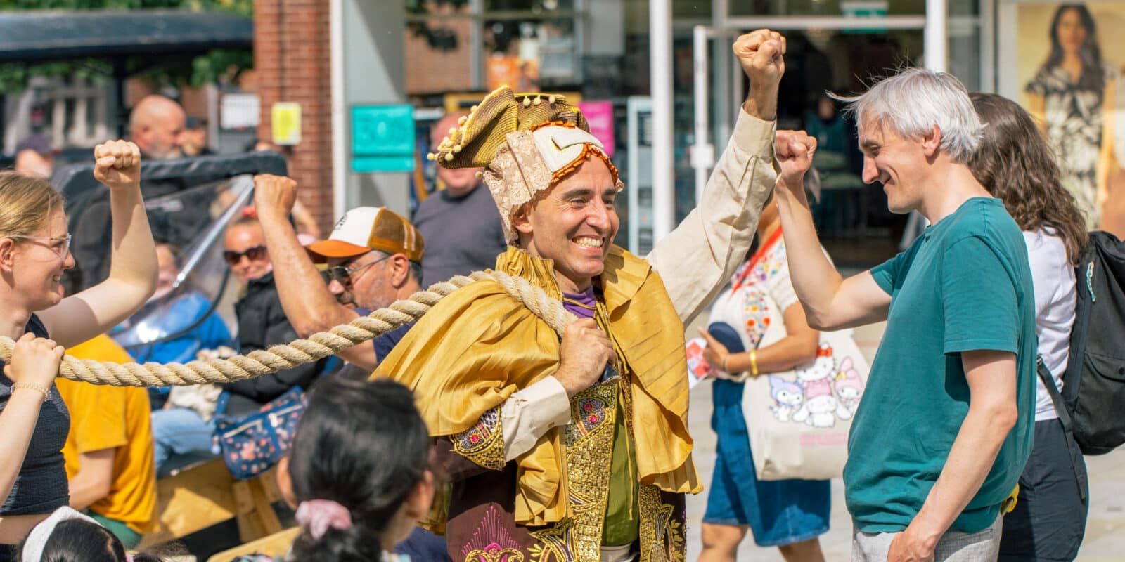 Ramshacklicious & Hijinx OTF2025 Katherine Mager 1 Person dressed eccentrically carrying a rope and celebrating