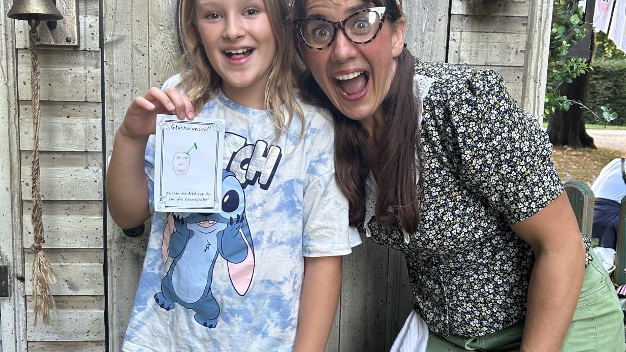 People posing outside The Magic Shed